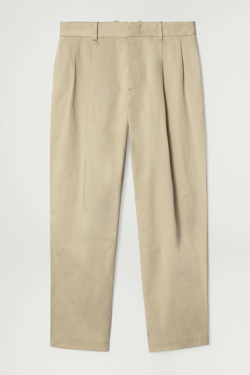 Relaxed Pleated Cotton Tapered Trousers in Beige