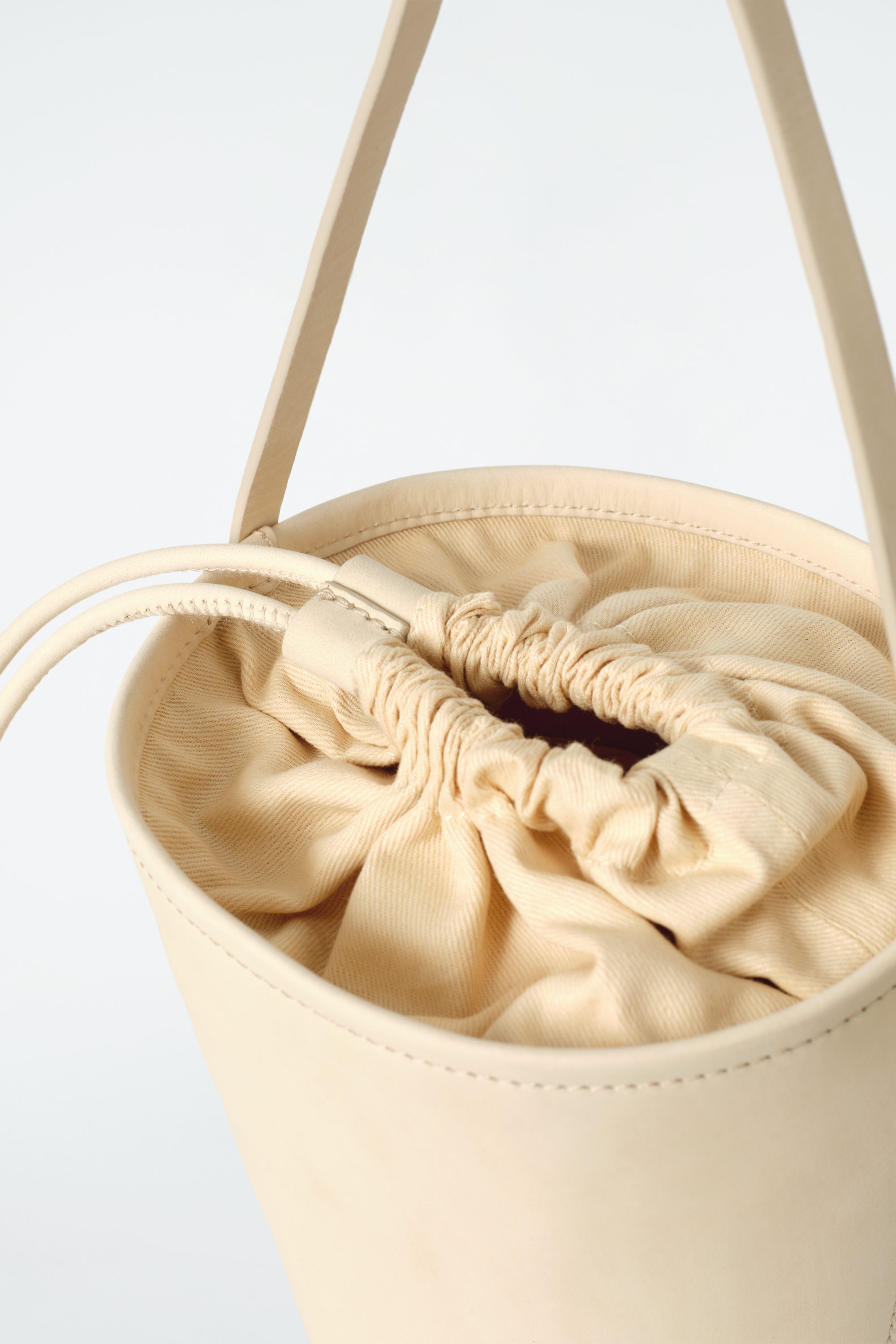 MINI BUCKET BAG - NUBUCK - BUTTERMILK | COS