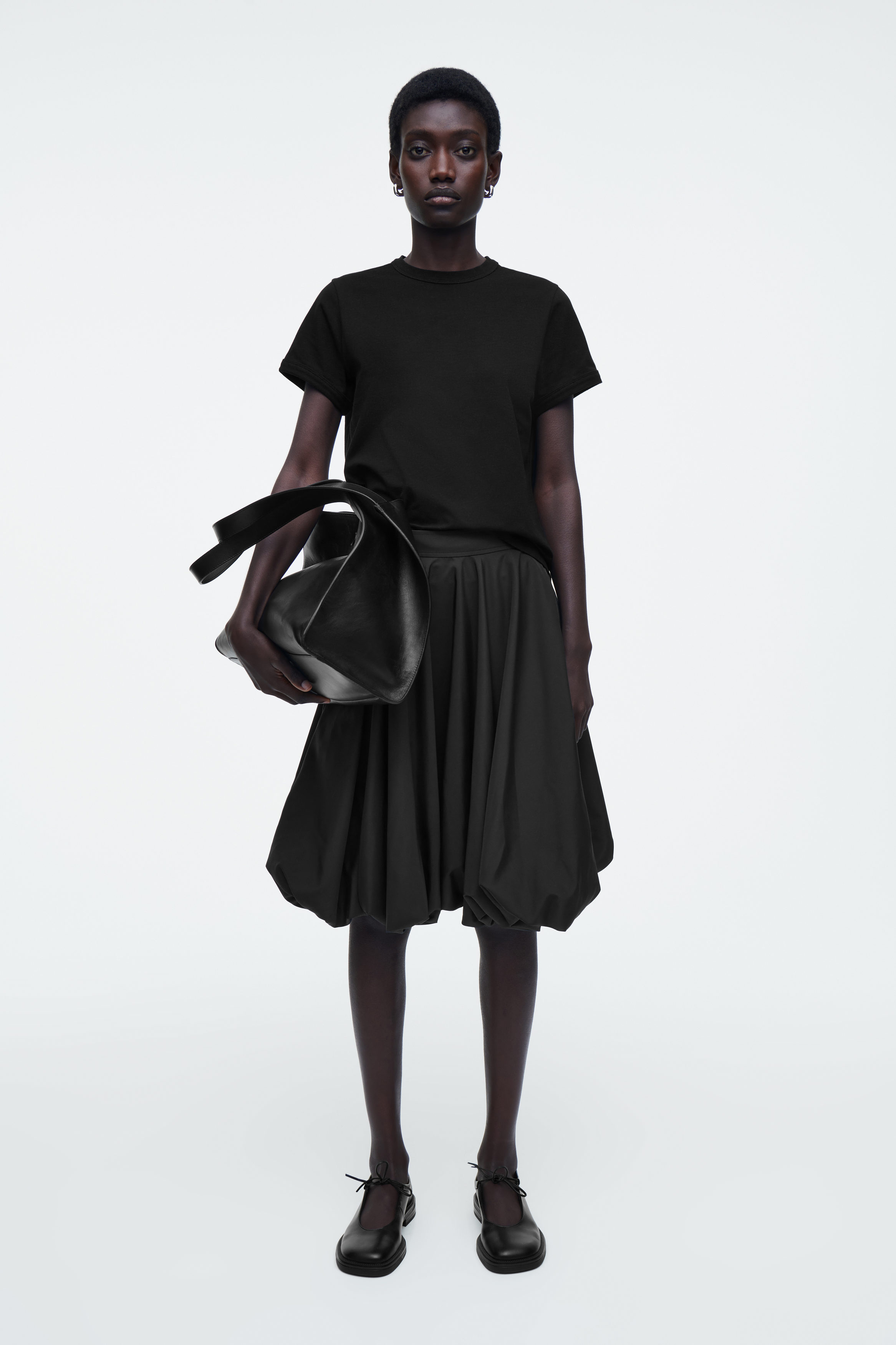 BUBBLE-HEM MINI SKIRT - BLACK