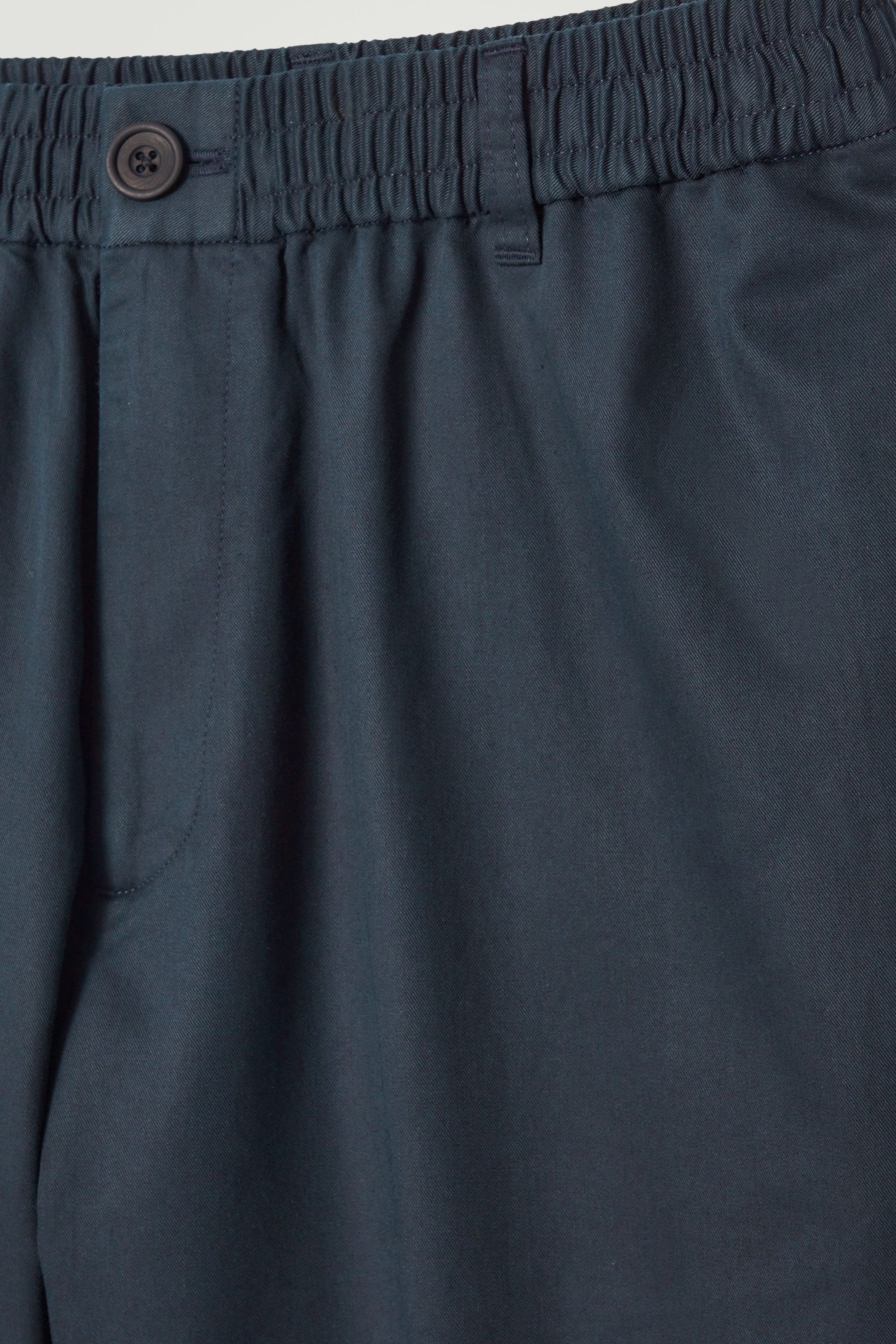 TAPERED ELASTICATED PANTS - NAVY | COS