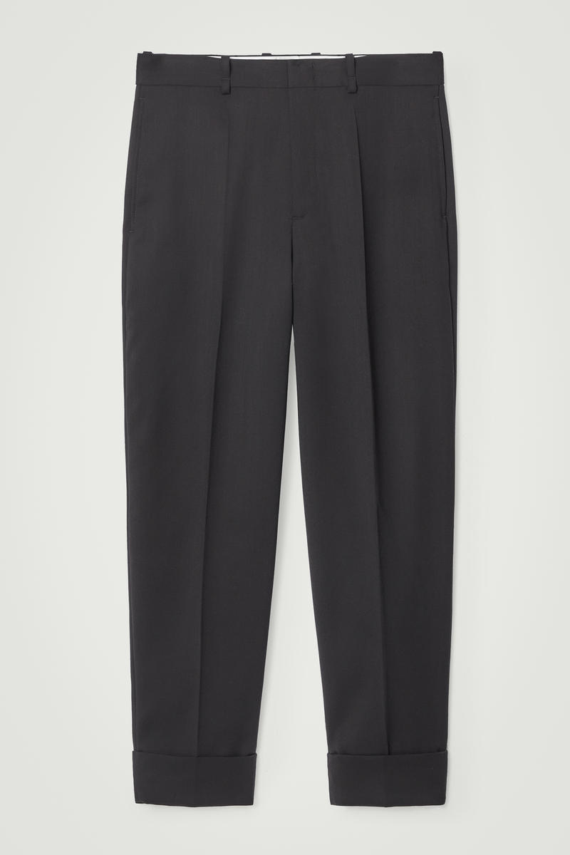 Shop Cos The Fold-up Tapered Trousers In Black