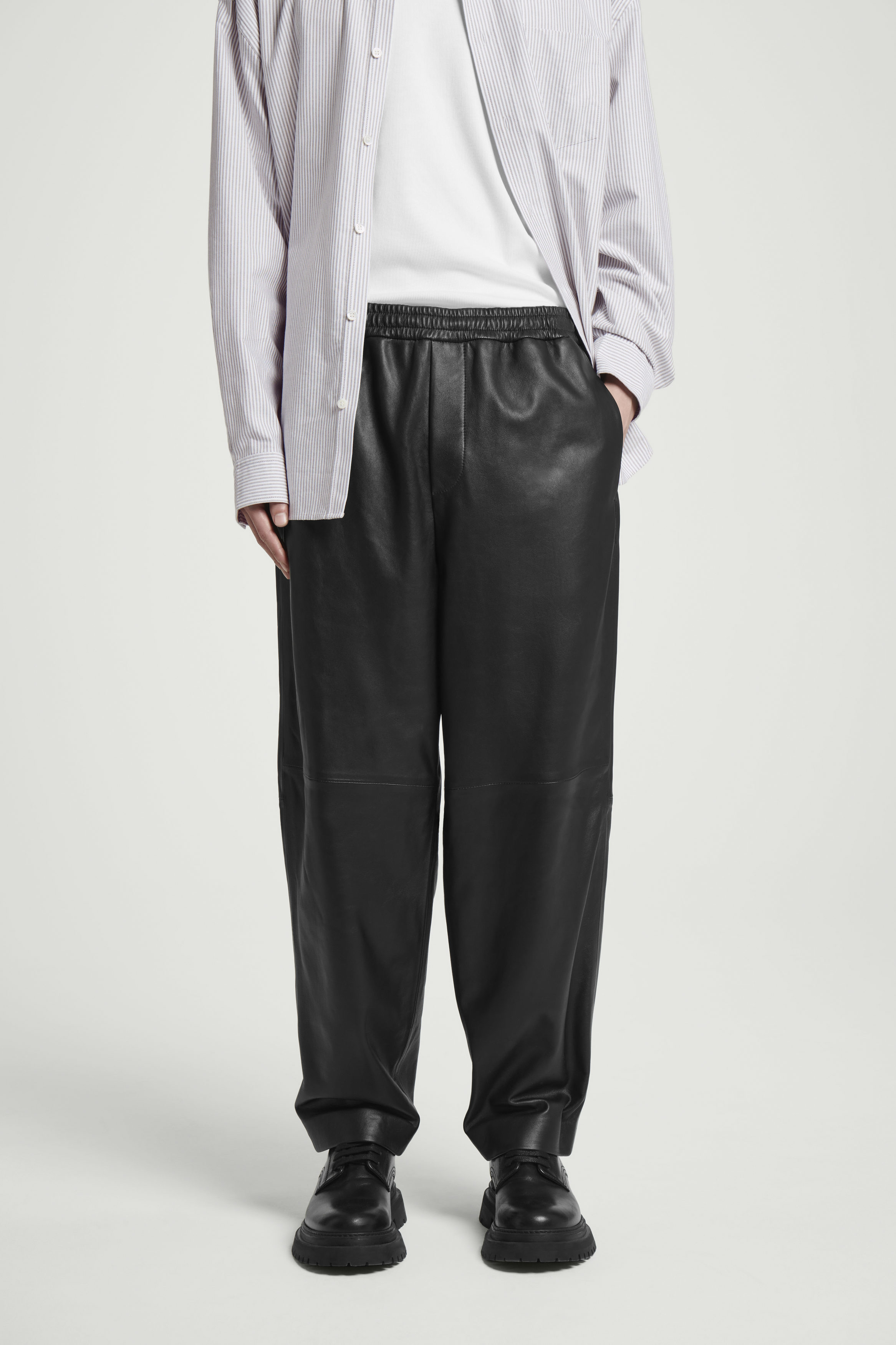 ELASTICATED TAPERED LEATHER JOGGERS - BLACK | COS