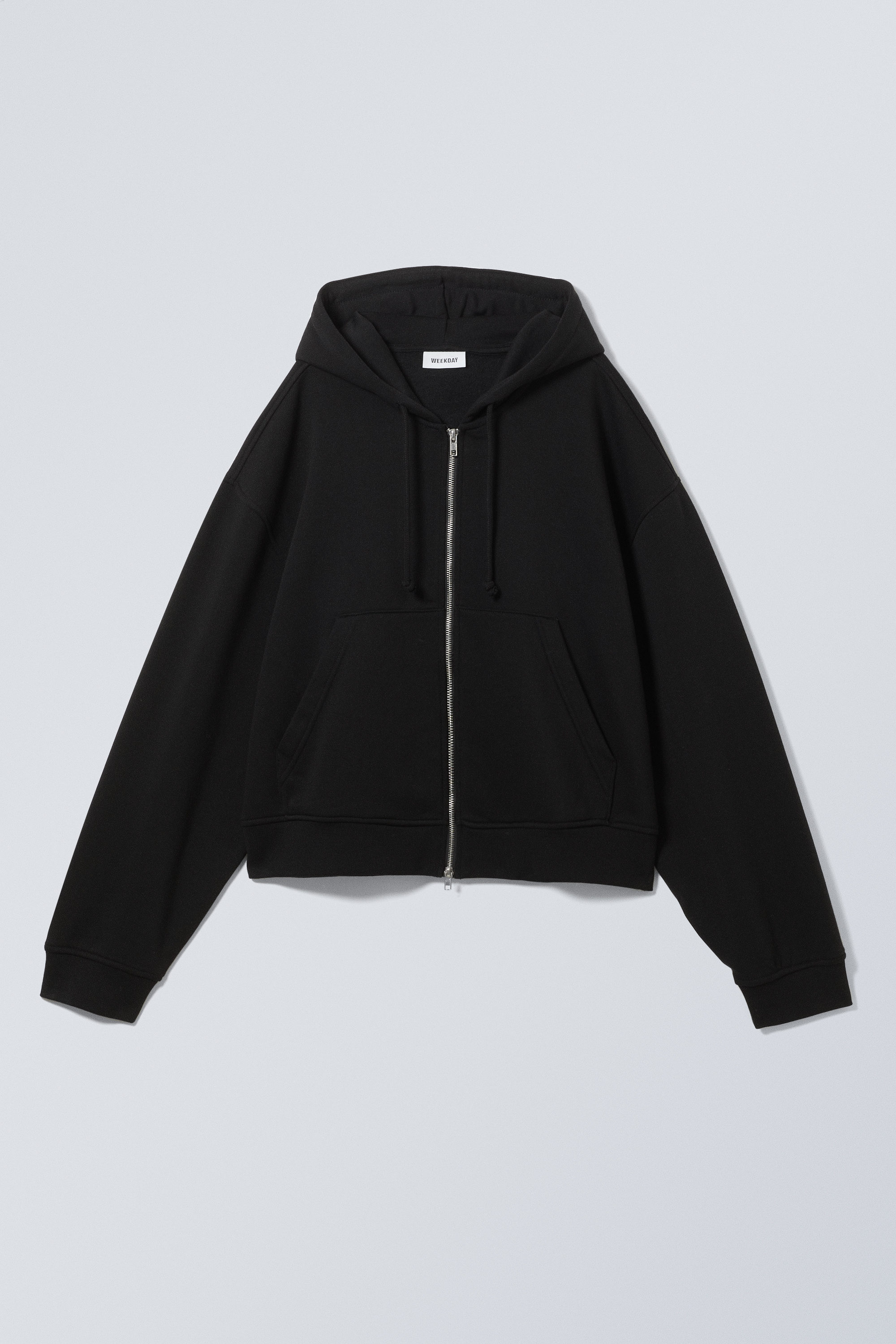 medeltjock boxig hoodie med dragkedja och lös passform - Svart | Weekday SE