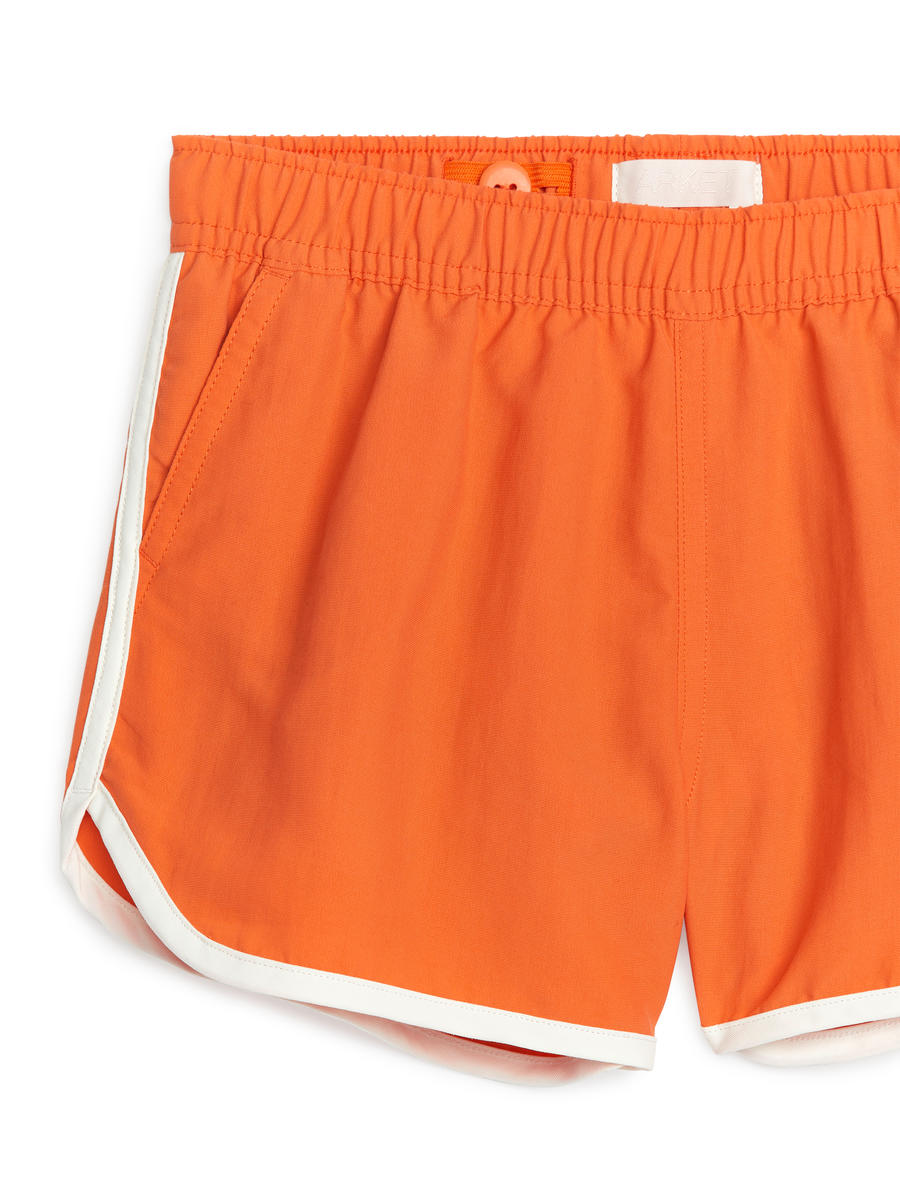 Badeshorts mit kontrastfarbenen Paspeln-#D67149-7848