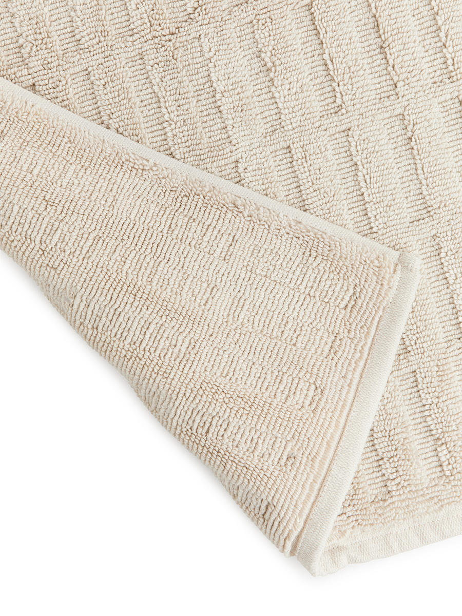 Badematte aus Baumwolle. - Beige - Homeware - 1176977001