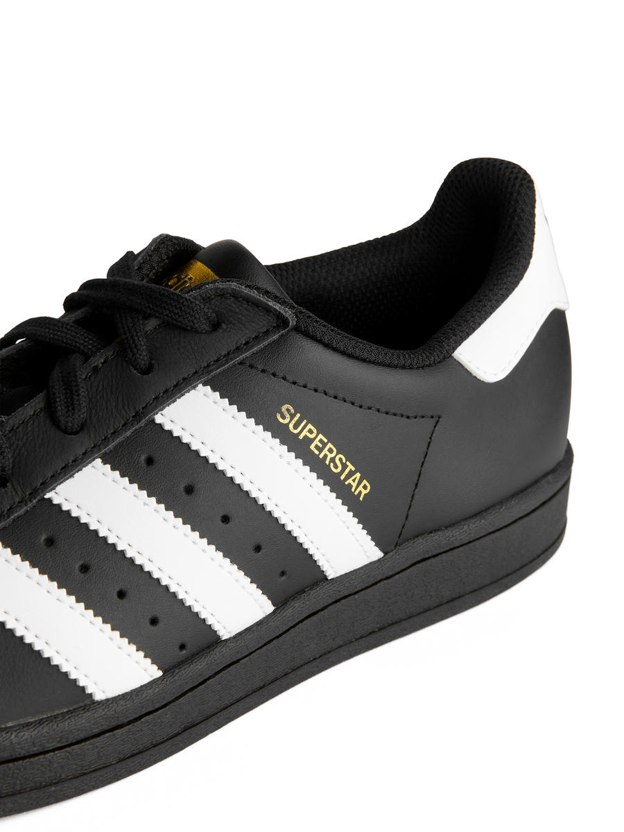 Black adidas superstar trainers womens best sale